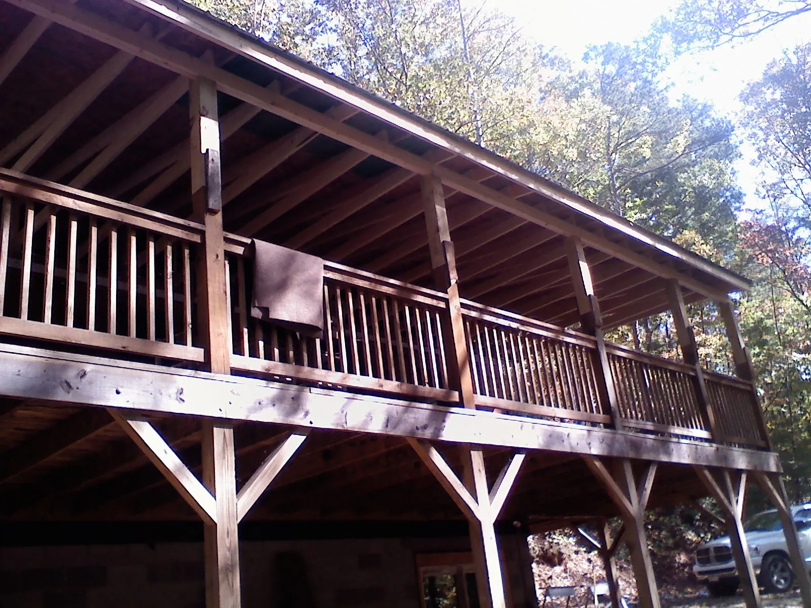 Timber framing under a new elevated porch and deck — Roof Leak Repair in Mount Holly Springs by Roofing Brothers